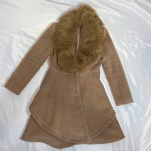 Worn once winter coat with removable faux fur. Very elegant